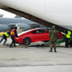Illustration for article titled How Not To Load Your Ferrari On A Plane
